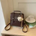 Brown vintage college style women backpack with cute plush puppy pendant daily commuter bag - With Charm / Coffee