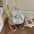 Stylish white polka dot backpack for women, casual daily school bag, trendy commuting daypack. - Beige With Charm