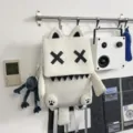 Cute cartoon design white student travel backpack with unique eyes and spacious casual daily use. - White With Pendant