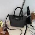 Black leather handbag with top handle and shoulder strap, stylish casual crossbody bag for women. - No Pendant / Black