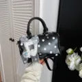 Black and white polka dot pillow handbag with cute music note pendant and lace bow. - Black With Pendant