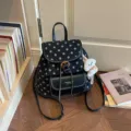 Black polka dot backpack variant with plush pendant, stylish casual school book bag daily commuting. - Black With Pendant