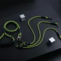 Detail view of the durable braided multi-dog leash in neon green and black with metal clasps. - Triple 3-Pet / Green