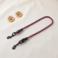 Durable double dog leash with two wooden paw tags, pink black braided 2-way pet walking lead. - Auxiliary Rope / Purple
