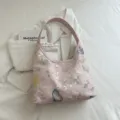 Bolso de hombro rosa bordado con delicados motivos florales y mariposas, bolso elegante. - Rosa