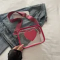 Sac bandoulière transparent pour femme, design élégant avec poche cœur rose et large sangle. - Rose