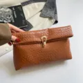 Brown woven leather clutch bag for women, stylish rolled edge underarm purse and daily bag. - Brown