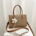 Korean style brown leather small square tote bag with shoulder strap and cute flower pendant. - With Charm / Brown
