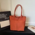 Orange canvas tote bag with front pockets, large capacity minimalist shoulder bag for women - Orange