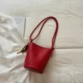Red woven bucket bag women shoulder crossbody bag stylish leather braided handbag daily purse - With Pendant / Red