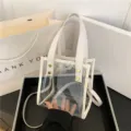 Borsa tote trasparente in PVC con bordo bianco, elegante borsa a tracolla per donna. - Bianco