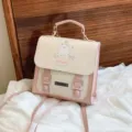 Grazioso zainetto rosa e bianco, elegante borsa casual in pelle PU per donne alla moda. - Rosa