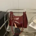 Wine red patent leather shoulder bag stylish baguette handbag with multiple straps for women. - Red