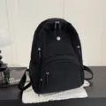 Sac à dos minimaliste en nylon noir pour femme, grand sac d'école de voyage décontracté. - Noir