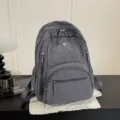 Sac à dos décontracté uni minimaliste pour femme, grand sac d'école gris quotidien. - Gris