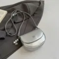 Stylish silver saddle crossbody bag for women, trendy mini shoulder bag with metal heart charms. - With Pendant / Silver