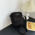 Black corduroy crossbody bag for women, trendy mini square shoulder bag with front pocket. - Black