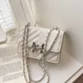 White quilted chain shoulder bag with metal bow chic elegant crossbody bag for women - White