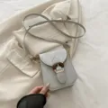 Sac bandoulière vertical gris pour femme, sac de téléphone en cuir PU minimaliste. - Argent