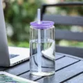 Clear glass tumbler cup with straw and purple lid, aesthetic portable drinkware for coffee and tea. - Solid Purple