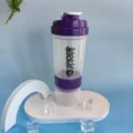 Transparent 3-layer protein shaker bottle with powder compartment for gym fitness workouts. - Purple