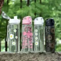 Bouteille d'eau de sport transparente portable variante avec motifs floraux pour l'exterieur. - 600ml / Mixte