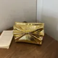 Gold metallic clutch bag for women, elegant large bow design, trendy evening party handbag. - Gold