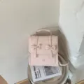 Zaino rosa con fiocco elegante per donna, stile coreano ins minimalista casual e pratico. - senza ciondolo / Rosa