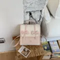 Zaino piccolo rosa e bianco con doppio fiocco carino, borsa elegante da donna per lavoro. - senza ciondolo / Bianco & Rosa