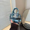 Sac bandoulière coquillage transparent motif serpent avec chaîne métallique mode femme. - Bleu