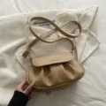 Korean style chic pleated shoulder bag for women, trendy commuter crossbody saddle bag in beige. - Khaki