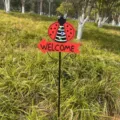 Metal ladybug garden stake with welcome sign detail, perfect for lawn and outdoor yard decoration. - Ladybug Style / 68x20cm