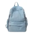 Light blue denim backpack for women, casual small book bag for daily travel and school. - Light Blue