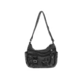 Bolso cruzado de mezclilla oscura con múltiples bolsillos y correa ajustable para uso diario. - Negro
