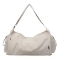 Casual beige canvas shoulder bag, large capacity crossbody travel tote for daily commute and school. - Off White