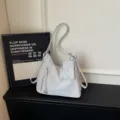 Casual white slouchy convertible shoulder bag and backpack, large capacity commuter style variant. - Blue