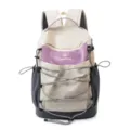 Sac à dos de randonnée beige avec poche avant violette, idéal pour les voyages et l'école. - Blanc et Violet