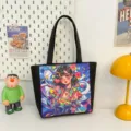 Zwarte canvas shopper tas met levendige anime meisje grafische print, stijlvolle mode handtas. - Stijl 2