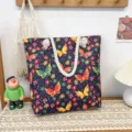 Canvas tote bag with colorful butterfly floral print, thick rope handles, beach shoulder bag. - Butterfly Flower Style