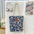Lässige Canvas Tragetasche mit stilvollem Buchstaben-Druck, große Schultertasche für den Alltag. - Muster-Stil 5