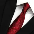 Men's classic floral silk tie detail, elegant red jacquard pattern for formal business wear. - Aegean Sea Wave Series - Dark Red