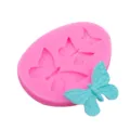 Pink silicone butterfly mold with blue fondant chocolate clay baking decoration tool variant. - TC3943 / Green