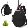 Black quilted tennis sling bag detail view, showing racket storage compartment and mesh pocket. - Black