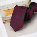Detailed view of the 6cm paisley pattern tie, classic red and navy formal business necktie. - Paisley Zipper Style / Red & Blue