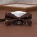 Retro brown bow tie detail featuring elegant geometric pattern for men's formal suit wear. - Coffee Gold Small Square