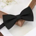 Classic black bow tie detail, premium fabric texture for formal business suit wedding events. - Knight Black Bow Tie