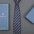 Detail shot of navy blue striped tie with gift box, elegant business accessory for men. - Striped Zipper Style (Long Gift Box) / 8cm Wide / Aesthetic Gold