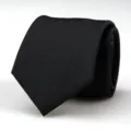 Detailed view of a classic black men's business necktie featuring fine textured diagonal weave. - 8cm Black Bold Striped Hand-Tied