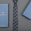 Classic black grid tie set with elegant blue gift box, perfect for business formal wear. - 6cm Business Black Plaid Zipper (With Long Gift Box)