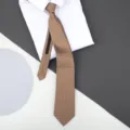 Detailed view of a brown patterned zipper tie, perfect for business formal wear. - 8cm Khaki Small Floral Zipper